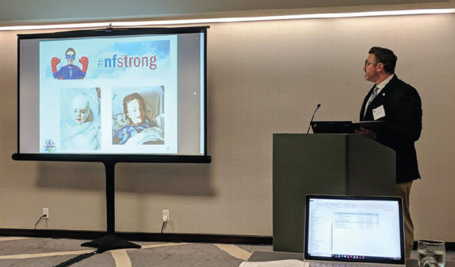 BLOG-reign-nf-01 NF-North-Central-Gregg Erickson speaking