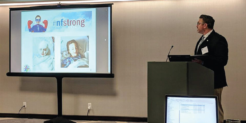 BLOG-reign-nf-01 NF-North-Central-Gregg Erickson speaking